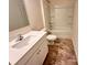 Bathroom featuring a white vanity, stone countertop, toilet, and shower over tub at 2623 Aubrey St, Monroe, NC 28110