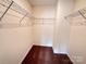 Walk-in closet with carpet and wire shelving for ample storage at 2623 Aubrey St, Monroe, NC 28110