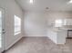 Dining room showcasing white cabinetry and stainless steel dishwasher, perfect for entertaining at 3114 Montcalm Ct, Monroe, NC 28110