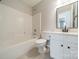 Bright bathroom with a shower and tub combination and sleek, black fixtures at 3554 Laurenhurst Ln, Charlotte, NC 28270