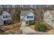 Charming two-story home featuring a brick accent garage and beautiful blue shutters at 3554 Laurenhurst Ln, Charlotte, NC 28270