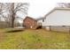 Backyard featuring an air conditioning unit, trampoline, and access to a wooden deck and stairs at 4187 Bessie Hudson Rd, Lancaster, SC 29720