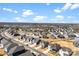 Aerial view of a suburban neighborhood with blue skies and scattered clouds at 4233 Poplin Grove Dr, Indian Trail, NC 28079