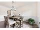 Formal dining room with modern lighting and chair rail detail at 4233 Poplin Grove Dr, Indian Trail, NC 28079