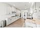 Modern kitchen featuring white cabinetry, granite countertops, and stainless steel appliances at 4233 Poplin Grove Dr, Indian Trail, NC 28079