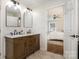 Well-appointed bathroom with a double sink vanity and stylish mirrors at 5019 Crooked Oak Ln, Charlotte, NC 28226