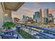 Balcony with city skyline views and comfortable seating, perfect for outdoor relaxation at 505 E 6Th St # 804, Charlotte, NC 28202