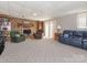 Spacious basement featuring a brick fireplace and comfortable seating at 5789 Gettysburg Nw Dr, Concord, NC 28027