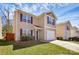 Charming two-story home featuring neutral siding, black shutters, well-manicured lawn, and an attached one-car garage at 5830 Kelden Walker Ln, Charlotte, NC 28269