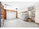 Spacious garage with concrete floor and metal storage shelves at 6325 Martin Lake Rd, Charlotte, NC 28227