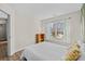 Bedroom featuring a large window and hardwood floors at 717 Meadow Lake Dr, Matthews, NC 28105