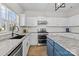 Stylish kitchen with white cabinetry, granite countertops, and stainless steel appliances at 717 Meadow Lake Dr, Matthews, NC 28105