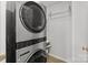 Laundry room equipped with a modern washer and dryer unit at 717 Meadow Lake Dr, Matthews, NC 28105