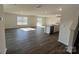 View of the open living space with an island kitchen and sliding glass doors to the backyard at 812 N Naughton St, Chester, SC 29706