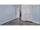 Cozy bedroom featuring neutral colored walls and gray floors at 8742 Belt Ln, Fort Mill, SC 29707