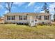 Inviting single-story home with a covered porch and well-kept lawn, providing great curb appeal at 8742 Belt Ln, Fort Mill, SC 29707