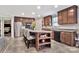 Modern kitchen with stainless steel appliances, dark cabinetry, a kitchen island with bar seating at 8742 Belt Ln, Fort Mill, SC 29707