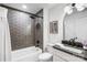 Modern bathroom with sleek fixtures, gray subway tile, and a clean, updated design at 908 Coventry Rd, Kannapolis, NC 28081