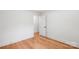 A room with hardwood floors, white walls, baseboards, and a window at 908 Coventry Rd, Kannapolis, NC 28081