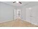 A spare bedroom featuring carpet, natural light and a closet at 944 Treasure Ct, Fort Mill, SC 29708