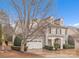 Charming two-story home featuring a two-car garage, inviting entrance and well-manicured landscaping at 944 Treasure Ct, Fort Mill, SC 29708