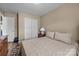 Cozy bedroom features closet, neutral wall paint, and carpet flooring for a comfortable feel at 11542 Laurel View Dr, Charlotte, NC 28273