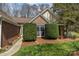 Charming home features a brick facade, well-manicured landscaping, and a neatly trimmed lawn at 11542 Laurel View Dr, Charlotte, NC 28273