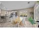 Bright eat-in kitchen area features updated appliances and a view to the yard at 11542 Laurel View Dr, Charlotte, NC 28273