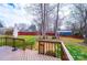 Spacious backyard with deck, lawn, and fencing at 1228 Hidden Creek Cir, Hickory, NC 28602