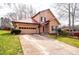 Lovely home featuring an attached two-car garage and well-maintained front yard at 1228 Hidden Creek Cir, Hickory, NC 28602