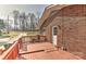 Cozy wooden deck offering a serene outdoor space adjacent to the brick home at 1235 Robinhood Cir, Charlotte, NC 28227