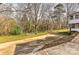 A concrete patio area overlooking the backyard, providing space for outdoor entertaining at 1235 Robinhood Cir, Charlotte, NC 28227