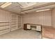 This room in the basement has ample shelving and storage space available at 1235 Robinhood Cir, Charlotte, NC 28227