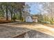A driveway leading to a barn and other structures on the property at 1235 Robinhood Cir, Charlotte, NC 28227