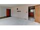 Spacious room with a view into the kitchen and interesting wall decor at 1235 Robinhood Cir, Charlotte, NC 28227