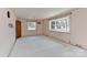 Sunny room featuring large windows, enhancing the natural light and airy feel at 1235 Robinhood Cir, Charlotte, NC 28227