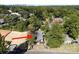 Aerial view of a home surrounded by mature trees and a spacious yard at 1239 Reece Rd, Charlotte, NC 28209