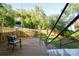 Inviting backyard deck with a seating area offers a relaxing outdoor space at 1239 Reece Rd, Charlotte, NC 28209