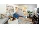 Inviting living room featuring hardwood floors, neutral tones, and a view to the kitchen at 1239 Reece Rd, Charlotte, NC 28209