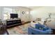 Bright living room with hardwood floors and plenty of natural light at 1239 Reece Rd, Charlotte, NC 28209