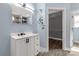 Bathroom with tiled floors, neutral paint, walk in shower and vanity at 13030 Homewood Dr # 12, Charlotte, NC 28262