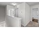 Upstairs hallway with bathroom and bedroom at 136 S Bell Ave, Albemarle, NC 28001