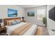 A staged main bedroom features a well-lit room with simple decor at 136 S Bell Ave, Albemarle, NC 28001