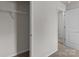Walk-in closet with neutral walls and carpet, featuring a single wire shelf at 138 S Bell Ave, Albemarle, NC 28001
