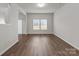 Bright living room space with natural light and contemporary flooring at 138 S Bell Ave, Albemarle, NC 28001