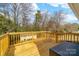 View of the wooden deck overlooking the yard. Nice spot to relax and unwind at 219 Ferstl Ave, Belmont, NC 28012