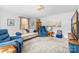 Bright and airy living room with plush seating, modern decor, and ample natural light at 219 Ferstl Ave, Belmont, NC 28012