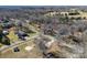 See this property from above, nestled in a peaceful neighborhood with mature trees and a charming brick home at 305 Plantation Dr, Kings Mountain, NC 28086