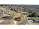 An aerial view of a beautiful neighborhood featuring a well-maintained lawn, a charming home, and a serene setting at 305 Plantation Dr, Kings Mountain, NC 28086