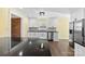 Beautiful kitchen featuring white cabinetry, stainless steel appliances, and stone countertops at 305 Plantation Dr, Kings Mountain, NC 28086
